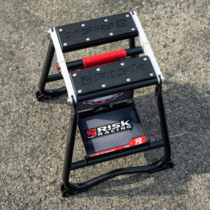 Carreras de riesgo F.F.S. Soporte plegable de fábrica en el foso