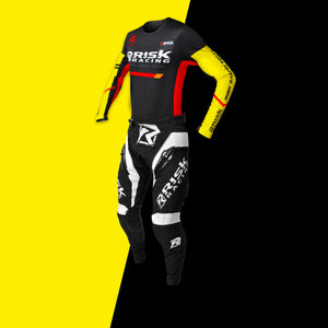 Risk Racing Motocross Jersey Black Yellow shown with a pair of VENTilate PRO pants on a black and yellow background